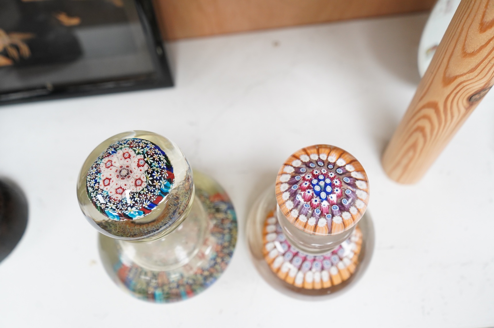 A 19th century millefiori glass inkwell and a similar 20th century inkwell. (2). Largest 16.5cm high